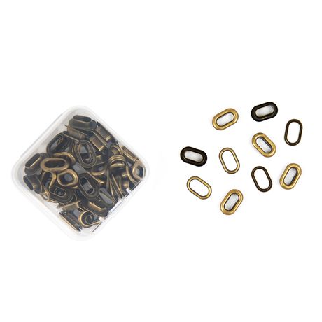 Assorted metal rings in a clear container on a white background