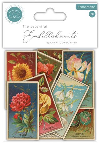 Packaged floral embellishments by Craft Consortium with colorful illustrations of flowers.