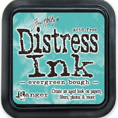 A Tim Holtz Distress Ink pad in the shade 'evergreen bough', featuring a teal-green ink pad visible through a clear window, surrounded by a black plastic frame.