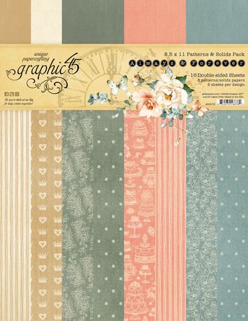 Collection of patterned and solid papers with decorative elements on a cardboard packaging.