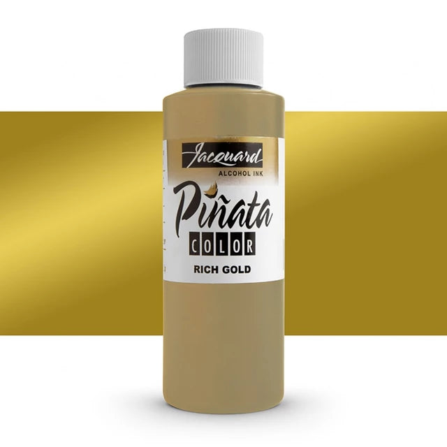A bottle of Jacquard Alcohol Ink Piinata Color in the shade Rich Gold, shown against a white background with a wide horizontal gold color band behind it.