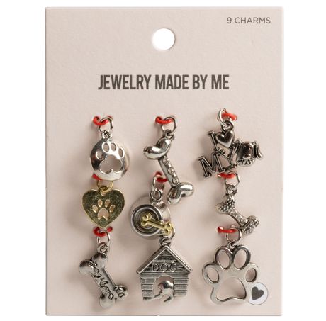 Set of charms on a 'Jewelry Made by Me' card with various designs including paw prints and hearts.