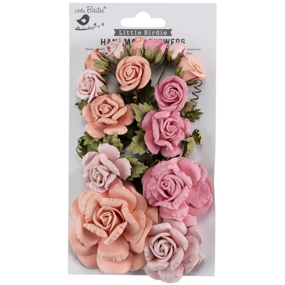 Packaged pink and peach flowers with green leaves on a white background