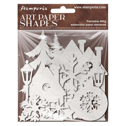 Stamperia Art Paper Shapes watercolor paper elements in a clear plastic bag with a brown header card. The white paper cutouts include houses, trees, snowflakes, stars, and ornaments.