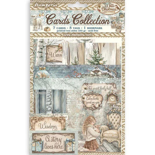 A printed card collection sheet from It's Merry Christmas by Emily Ricketts, featuring multiple vintage-style cards, tags, and a bookmark with winter and holiday illustrations, text such as 'Welcome,' 'Wisdom,' and 'A story lives here,' and a girl sitting by a fireplace.