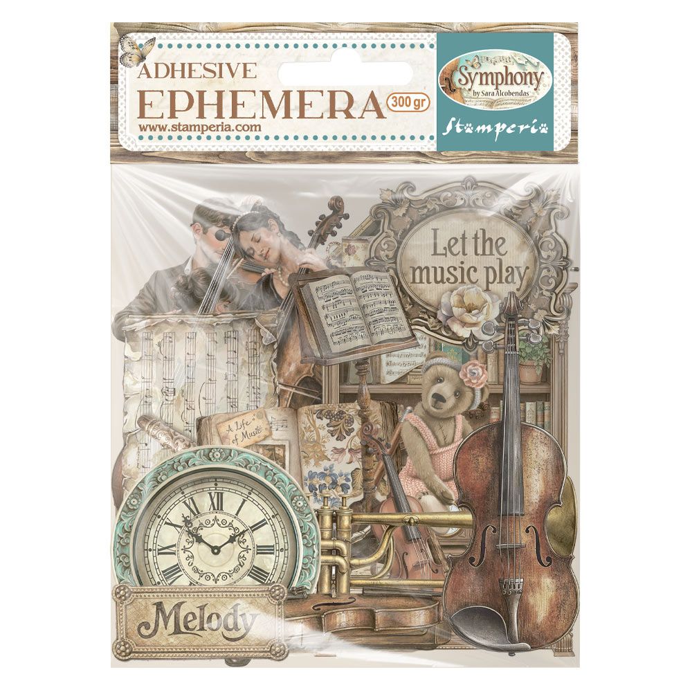 Packaging of adhesive ephemera with musical theme and 'Let the music play' text.