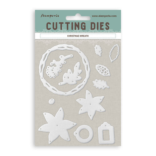 Set of white cutting dies for Christmas wreath design on a beige card with ' Stamperia' branding.