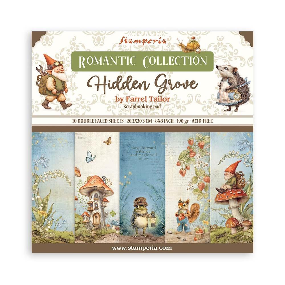 A collection of double-sided scrapbooking paper pads from Stamperia, featuring a romantic garden theme with illustrations of fairies and mushrooms, packaged in a box.