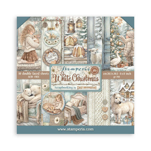 Stamperia White Christmas scrapbooking paper pad with festive illustrations on a white background