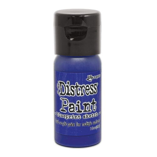 Blue bottle of Ranger Distress Paint with black cap on a white background