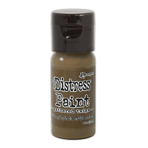 Bottle of Ranger Distress Paint in Gathered Twigs color on a white background