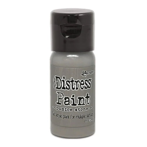 Bottle of Ranger Distress Paint in pumice stone color on a white background