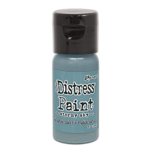 Bottle of Ranger Distress Paint in Stormy Sky color on a white background