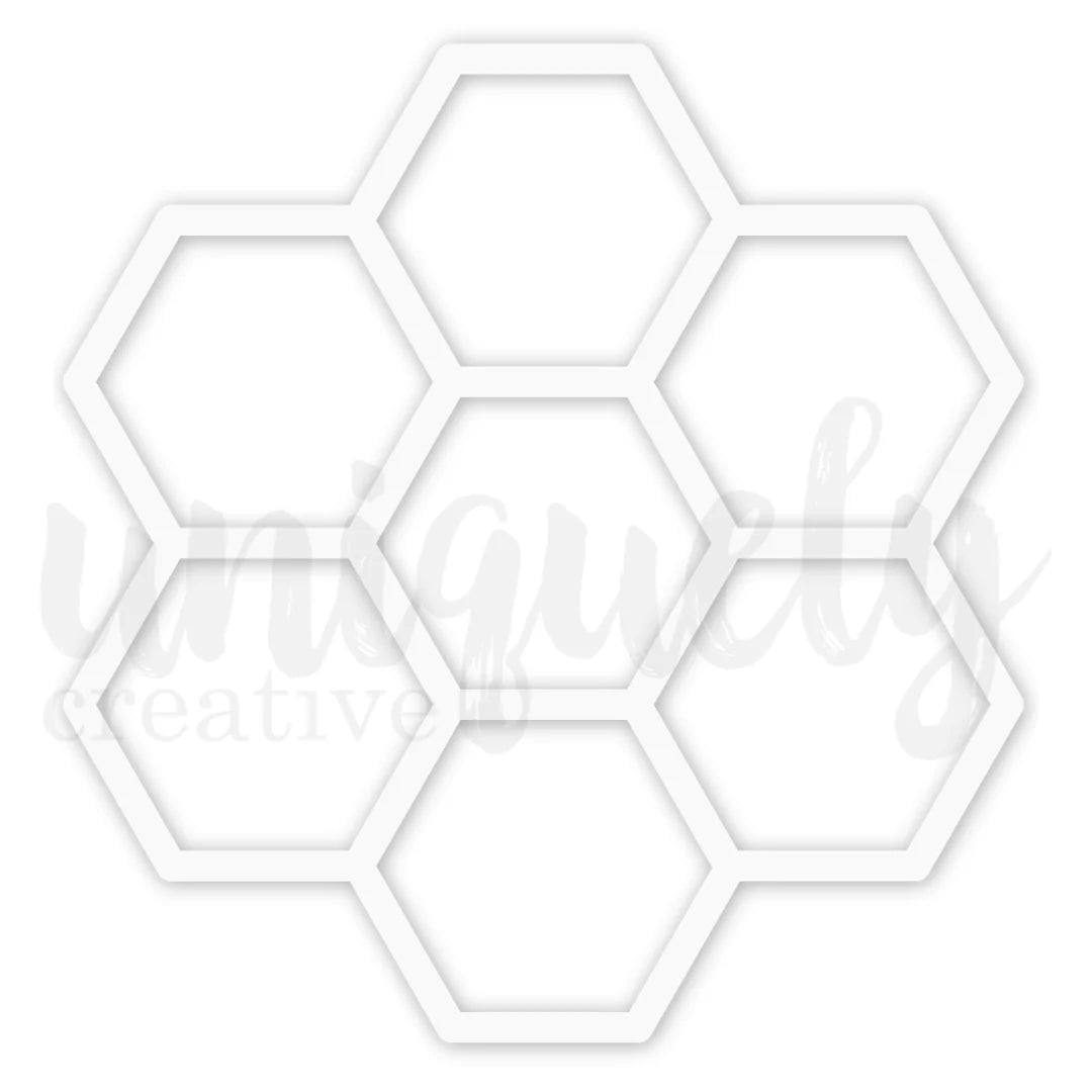 Hexagonal frames stacked on a white background