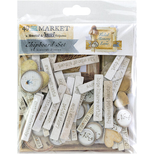 Packaged chipboard set with various die-cut pieces and text on a white background