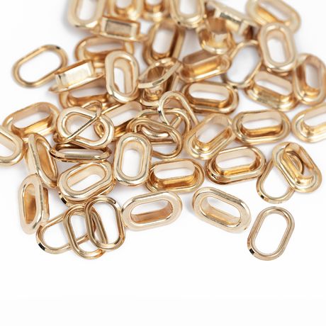Gold metal rings on a white background