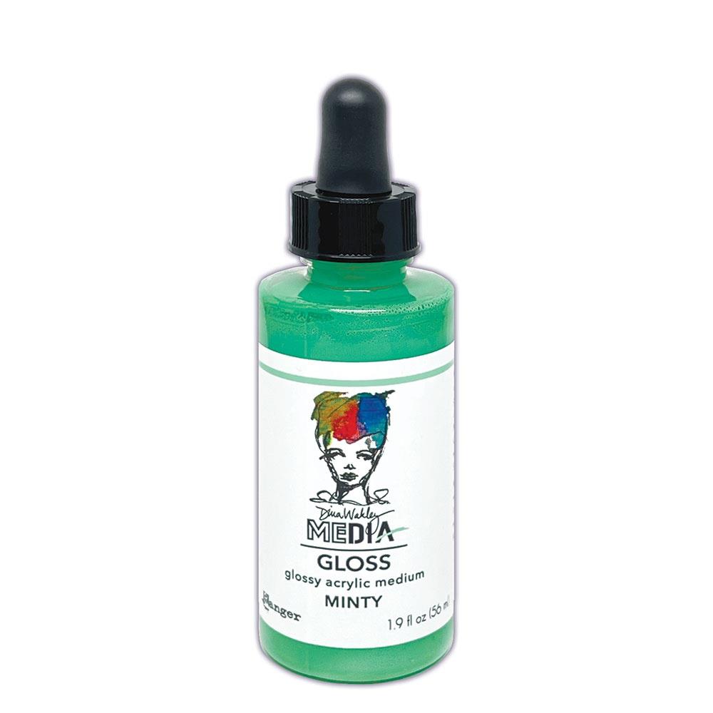 Bottle of green acrylic medium with a dropper