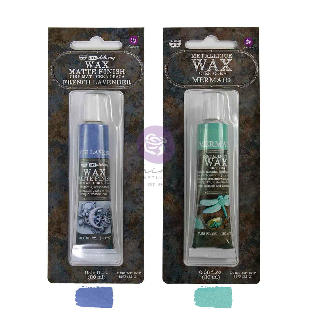 Two tubes metallic wax in their retail packaging, displayed side-by-side on a white background with color swatches below. The left tube French Lavender matte finish, and the right tube is Mermaid a light green metallic wax in a color.