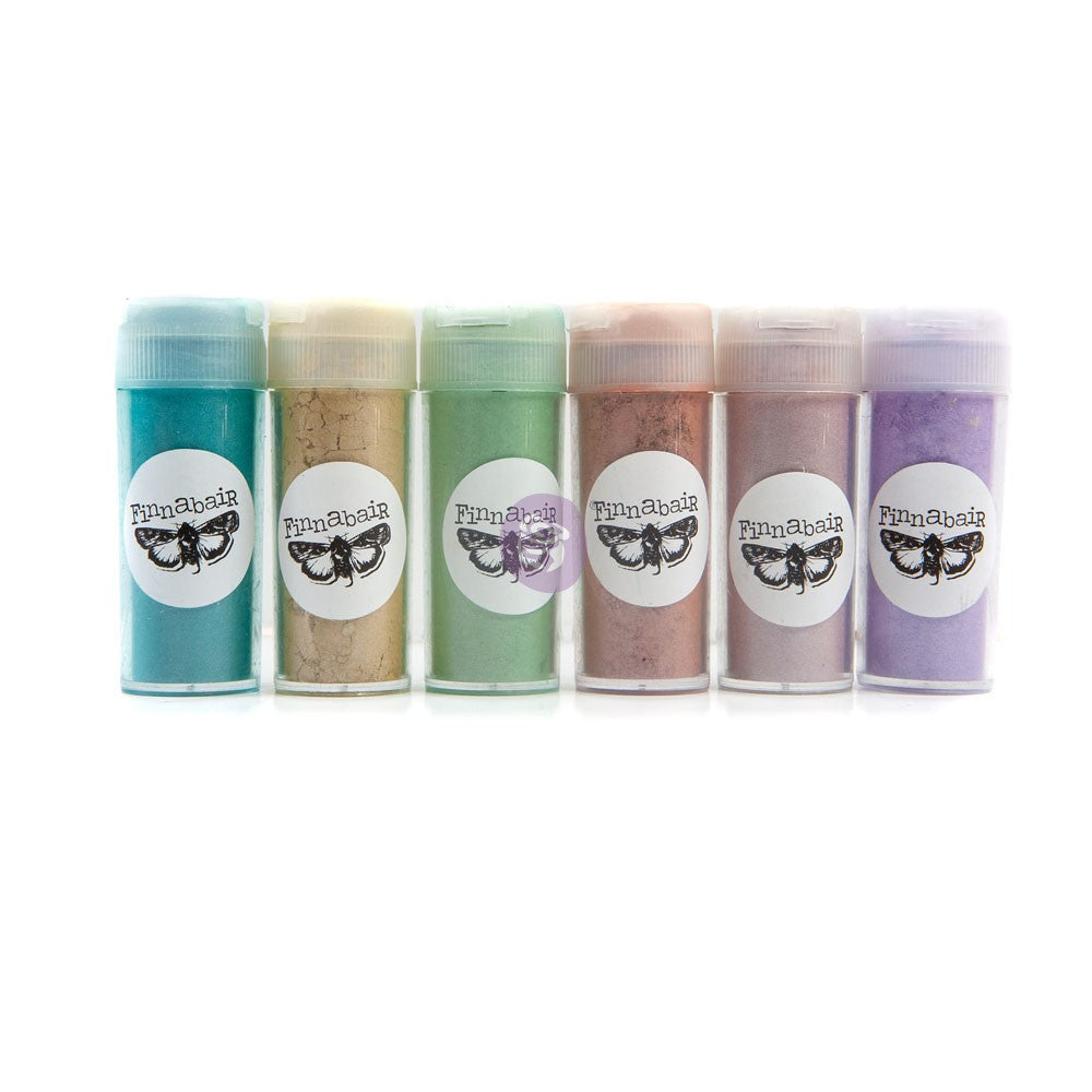 Six small plastic jars of FunSaba butterfly glitter in assorted pastel and earthy colors, arranged in a row on a white background.