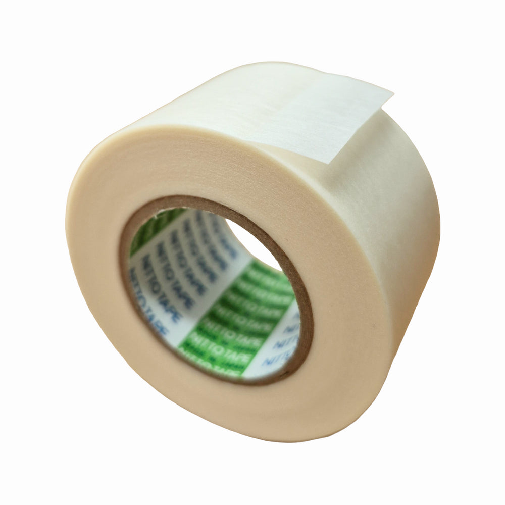 A roll of off-white adhesive tape with a green and white inner label, shown on a plain white background.