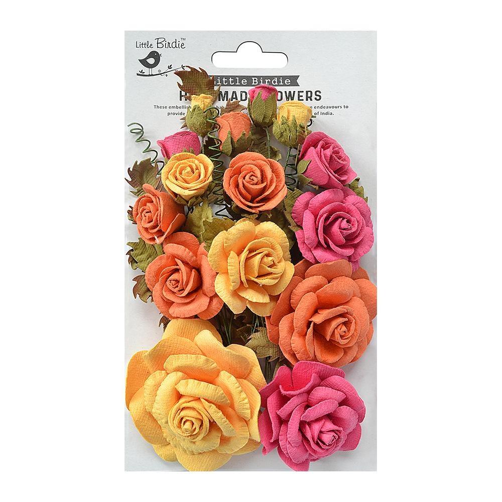 Packaged floral embellishments with colorful roses on a white background
