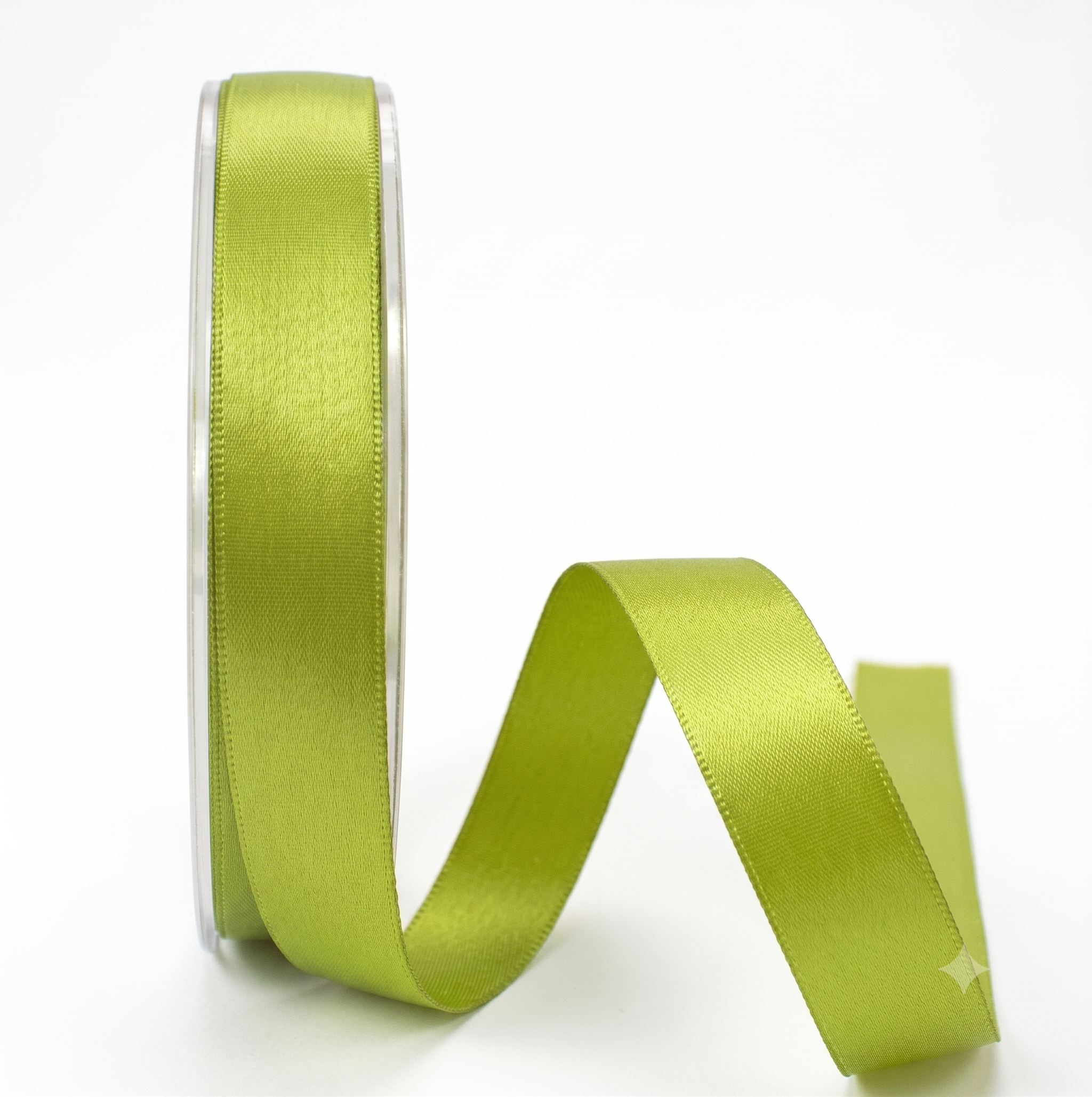A spool of lime green satin ribbon with the ribbon elegantly unrolled in a curved loop against a clean white background.