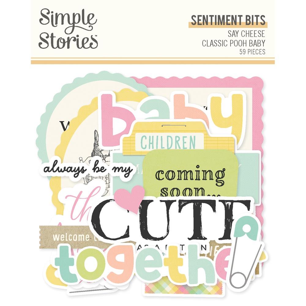 Collection of baby-themed sentiment die-cut pieces with colourful text on a white background.