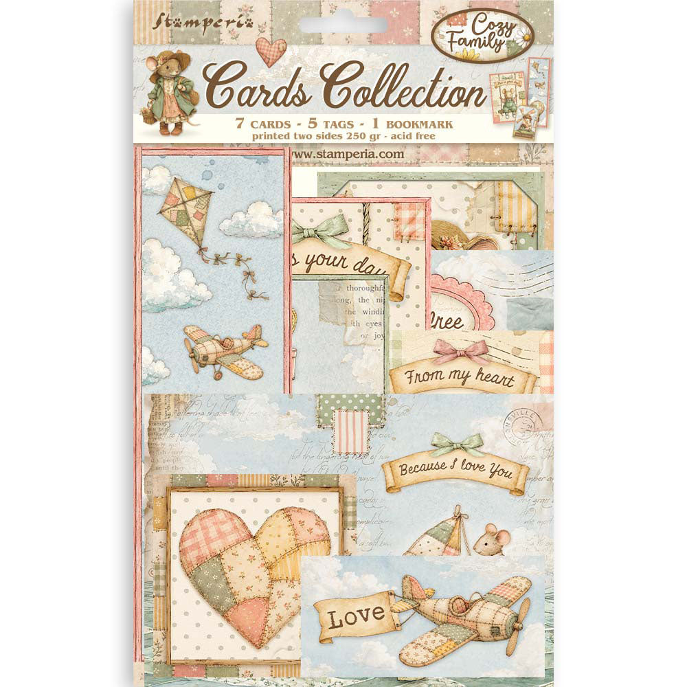 A package of Cozy Family by Stampedia 'Cards Collection' scrapbooking cards. The packaging features a vintage, whimsical design with illustrations of a teddy bear, airplanes, hearts, clouds, and postmarks in soft pastel colors like blue, pink, beige, and green.