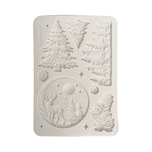 A rectangular white silicone mold with embossed winter forest designs, including pine trees, a deer in a moonlit circle, and pinecones, shown on a plain white background.