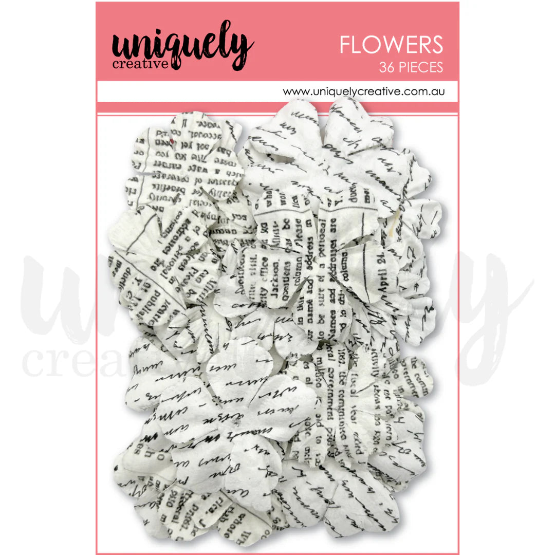 Decorative flowers with printed text on a pink and white background with 'uniquely creative' branding.