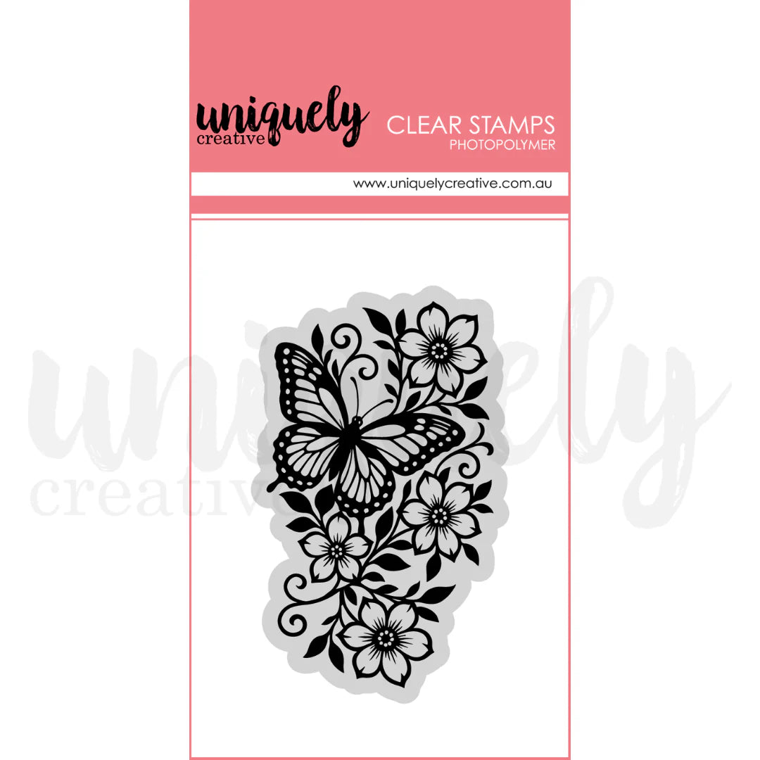 Butterfly and floral design clear stamp set on a pink background with 'uniquely creative' branding.