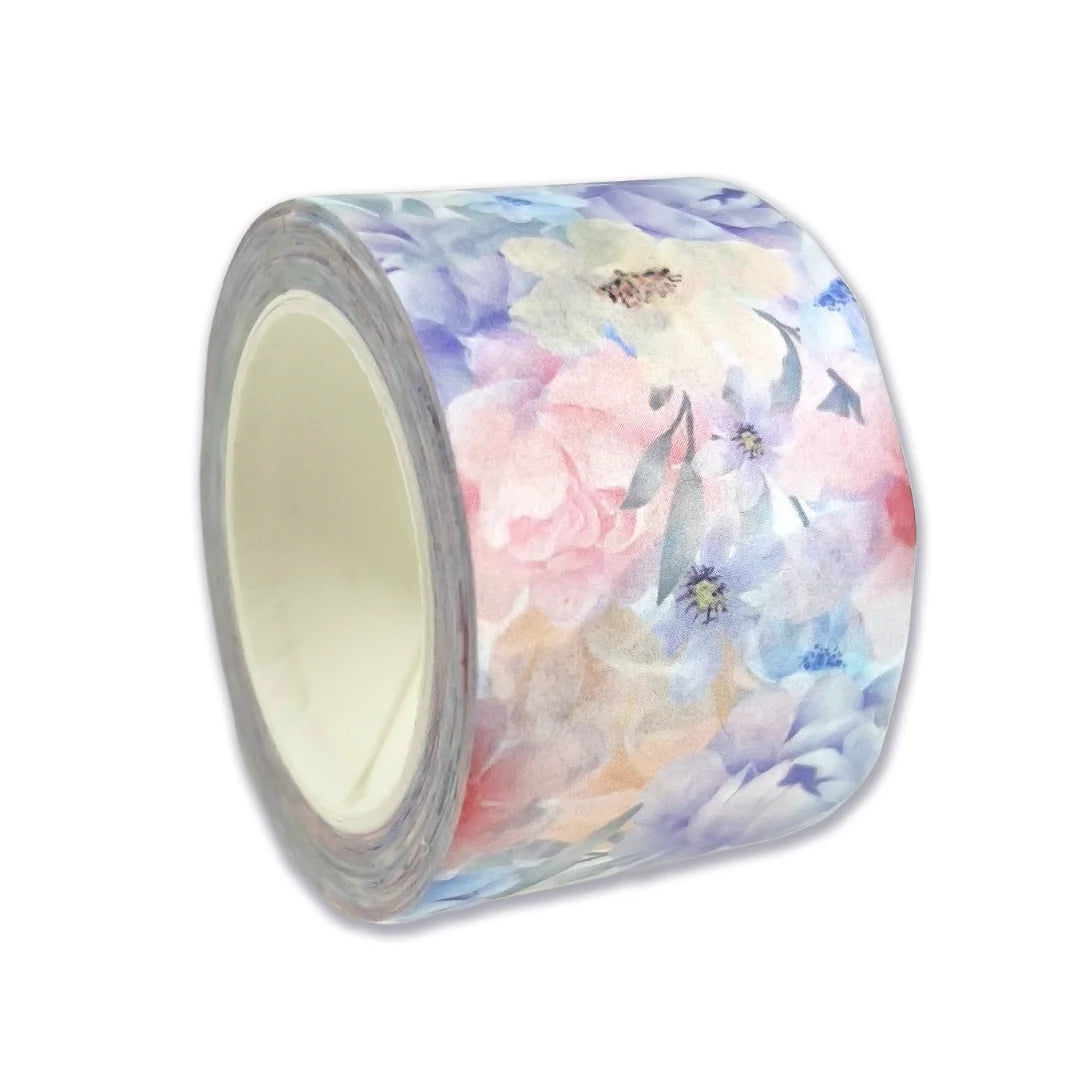 Roll of decorative tape with floral design on a white background