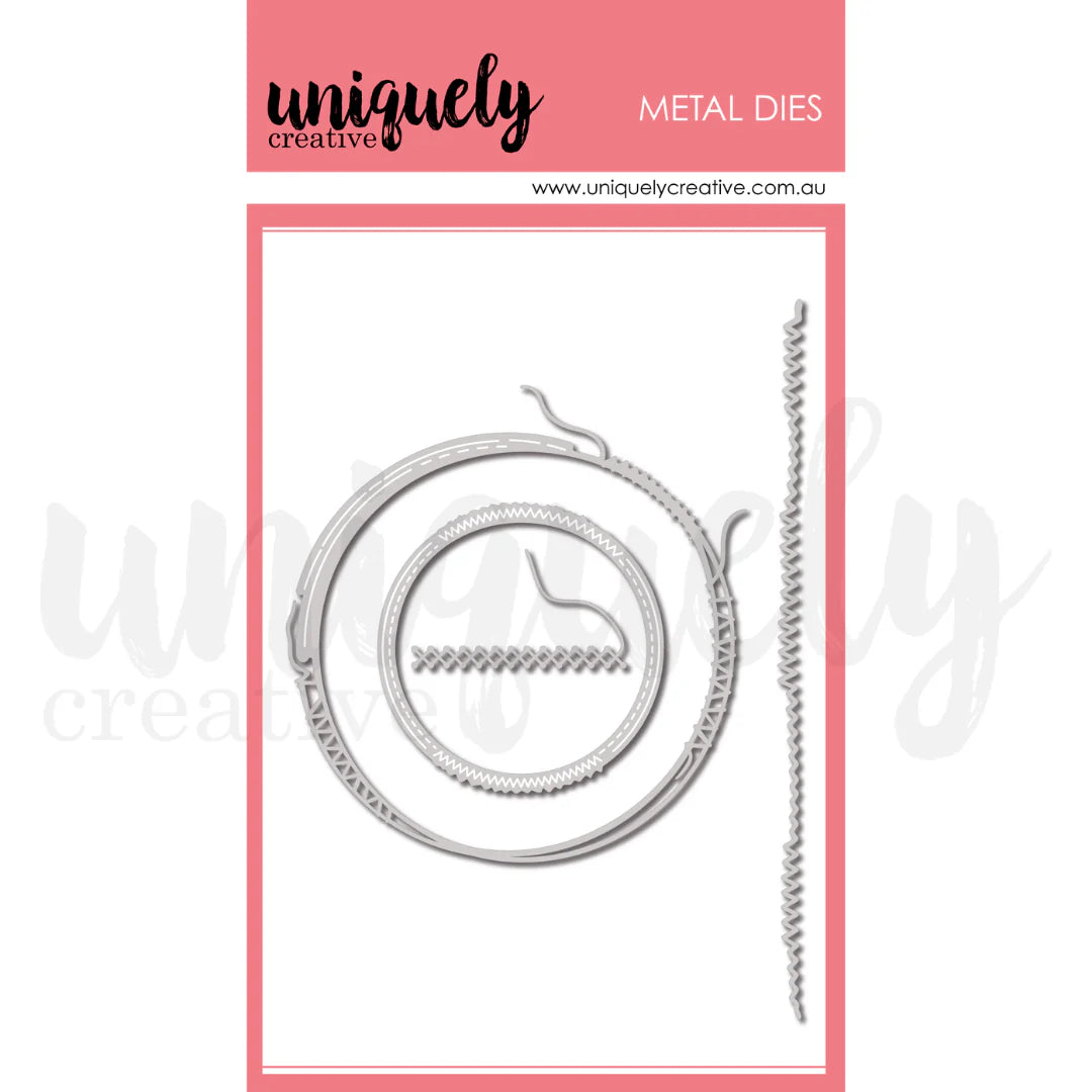 Metal dies with 'uniquely creative' branding on a white background