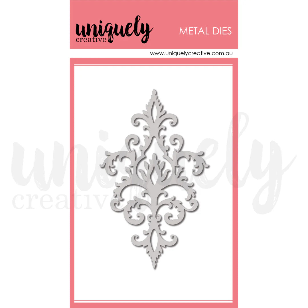 Decorative metal die with intricate design on a pink and white background, branded 'uniquely creative'.