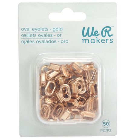 Pack of gold oval eyelets with 'We R Makers' branding on packaging.