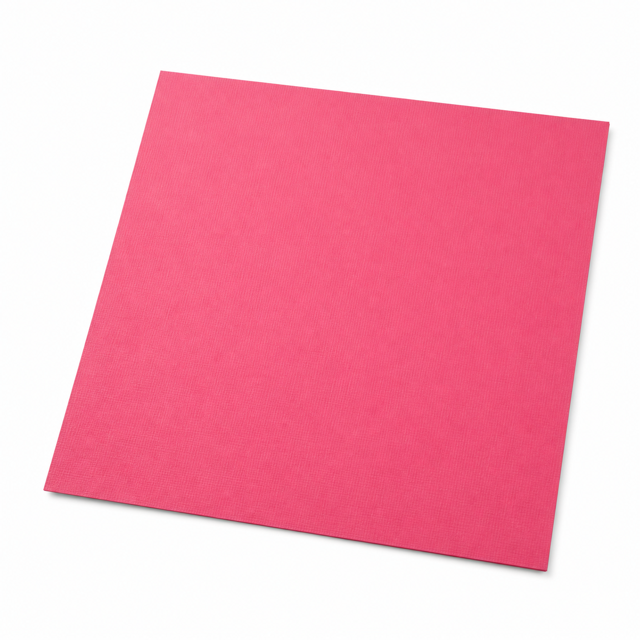 A square sheet of textured pink paper or cardstock shown at an angle on a clean white background.