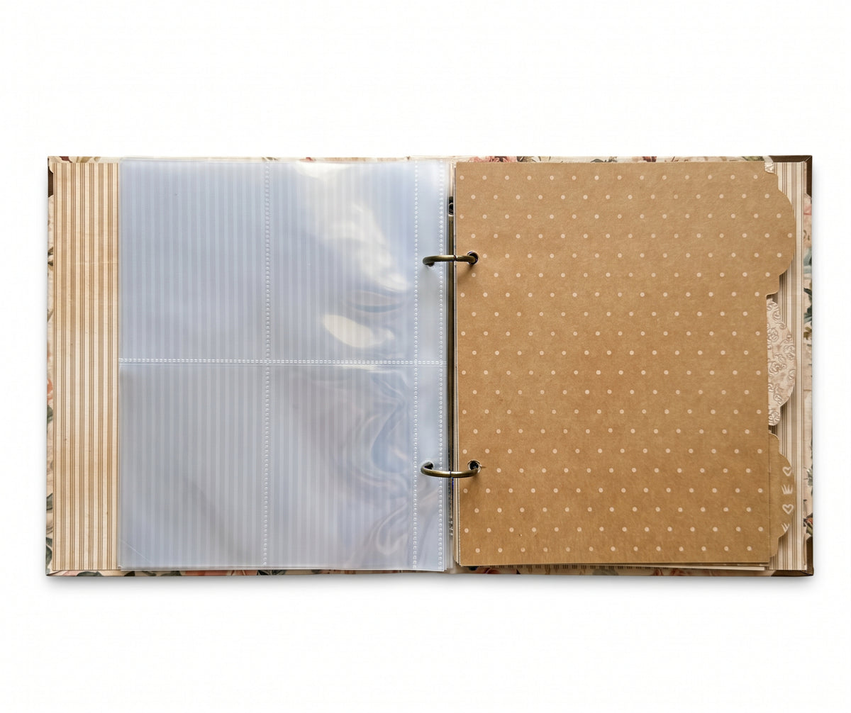 Inside view of the Graphic 45 Vintage Rose album showing a clear pocket page and patterned divider